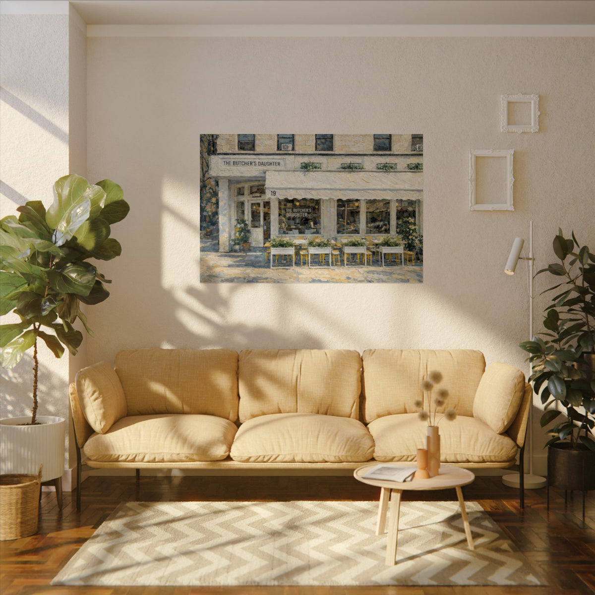 The Butcher's Daughter art poster on the wall above a sofa