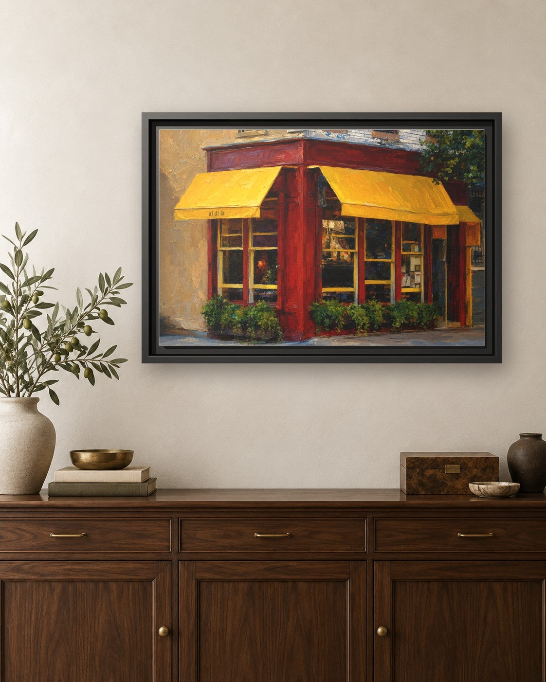 Al Di La Trattoria framed canvas print hanging above a credenza