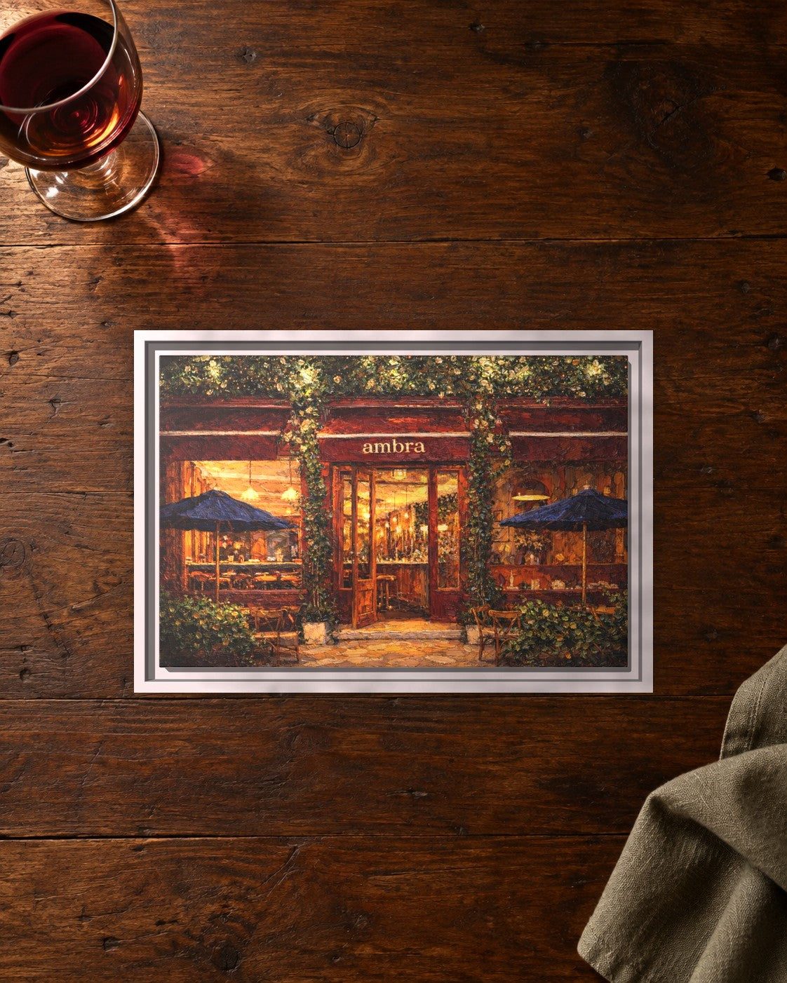 Ambra framed canvas print lying on a table