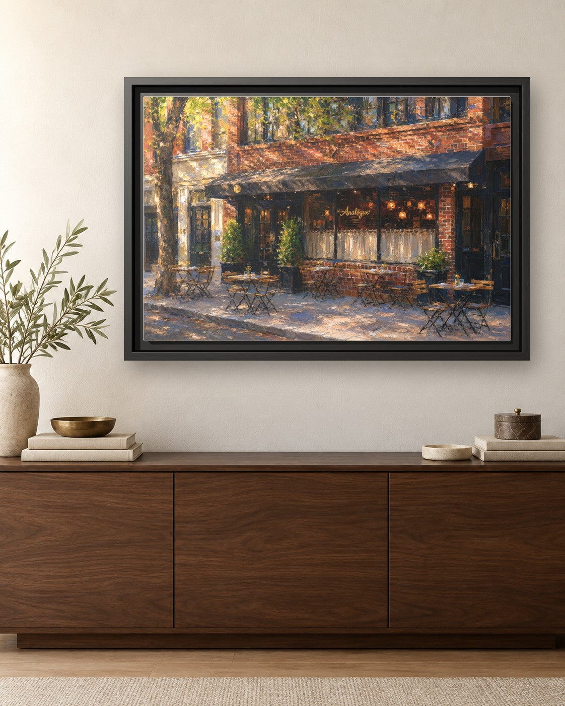Analogue framed canvas print hanging above a credenza