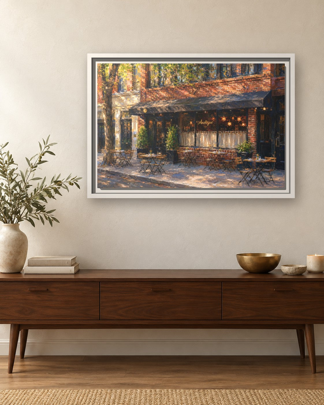Analogue framed canvas print hanging above a sideboard