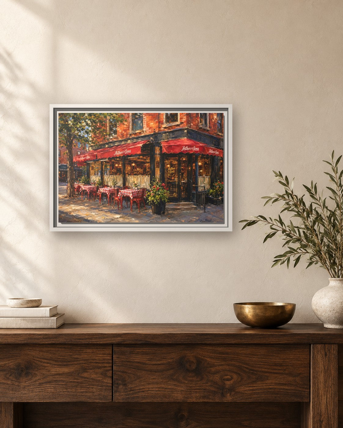 Arthur & Sons framed canvas print hanging above a sideboard