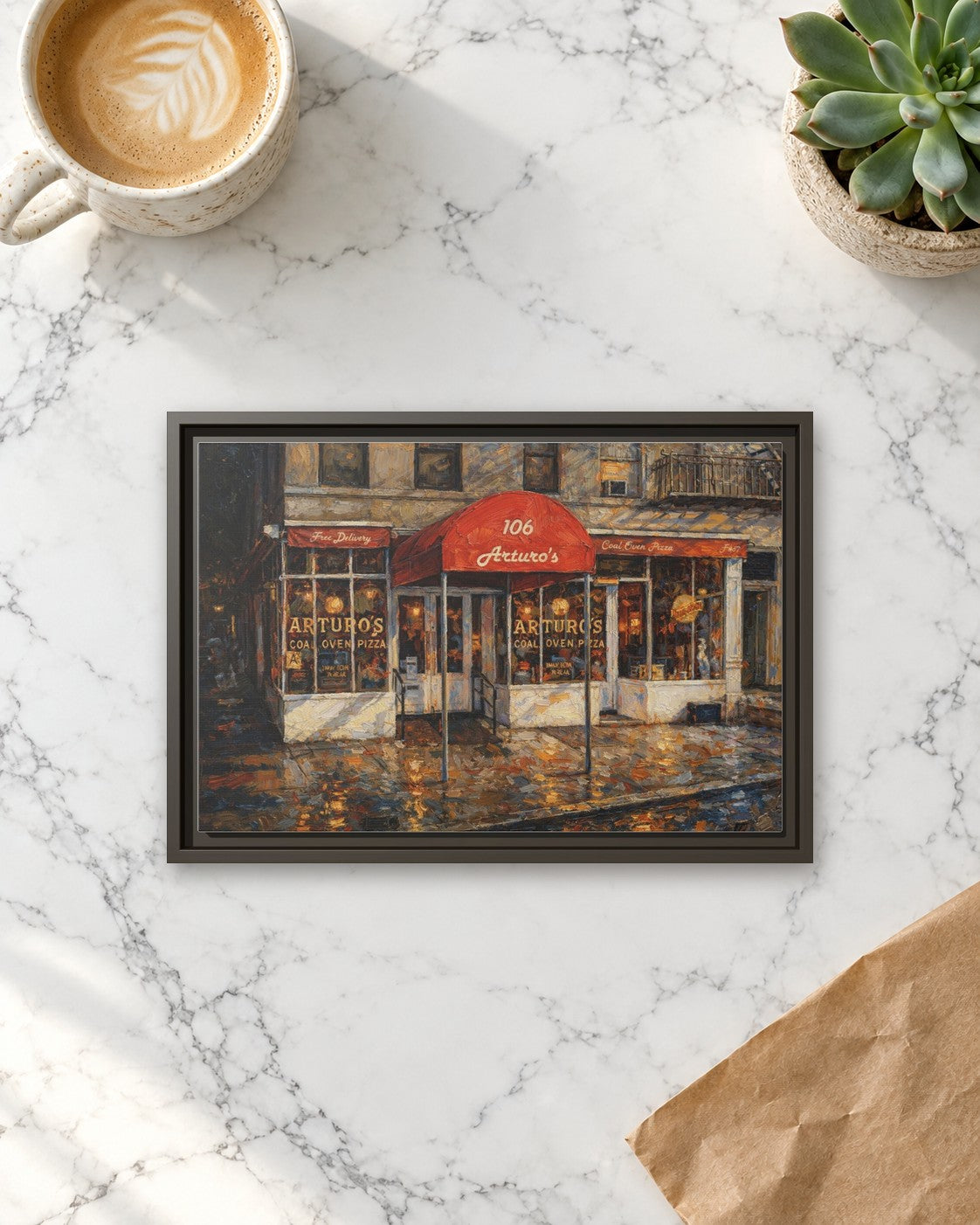 Arturo's Coal Oven Pizza framed canvas print lying on a table