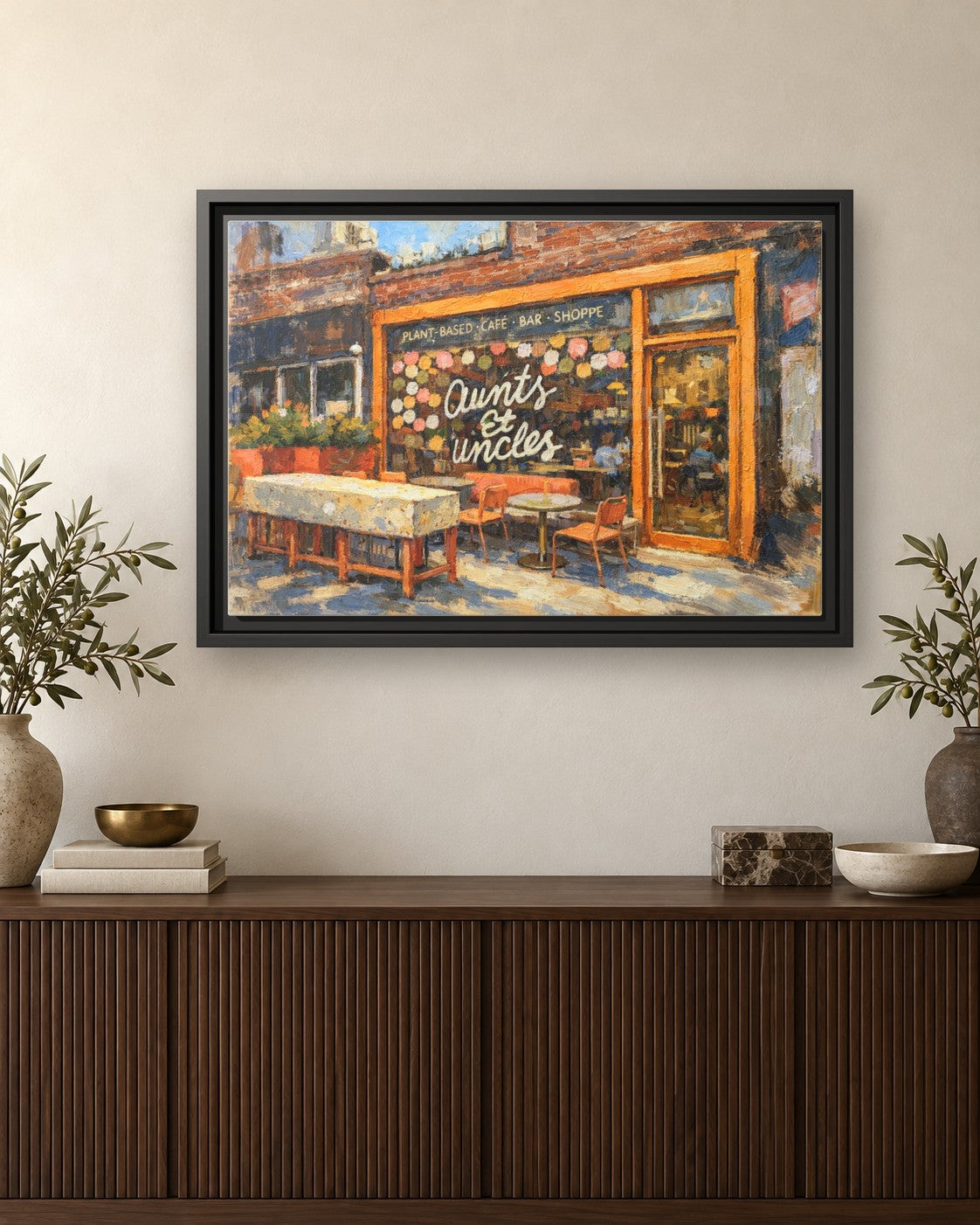 Aunts et Uncles framed canvas print hanging above a credenza