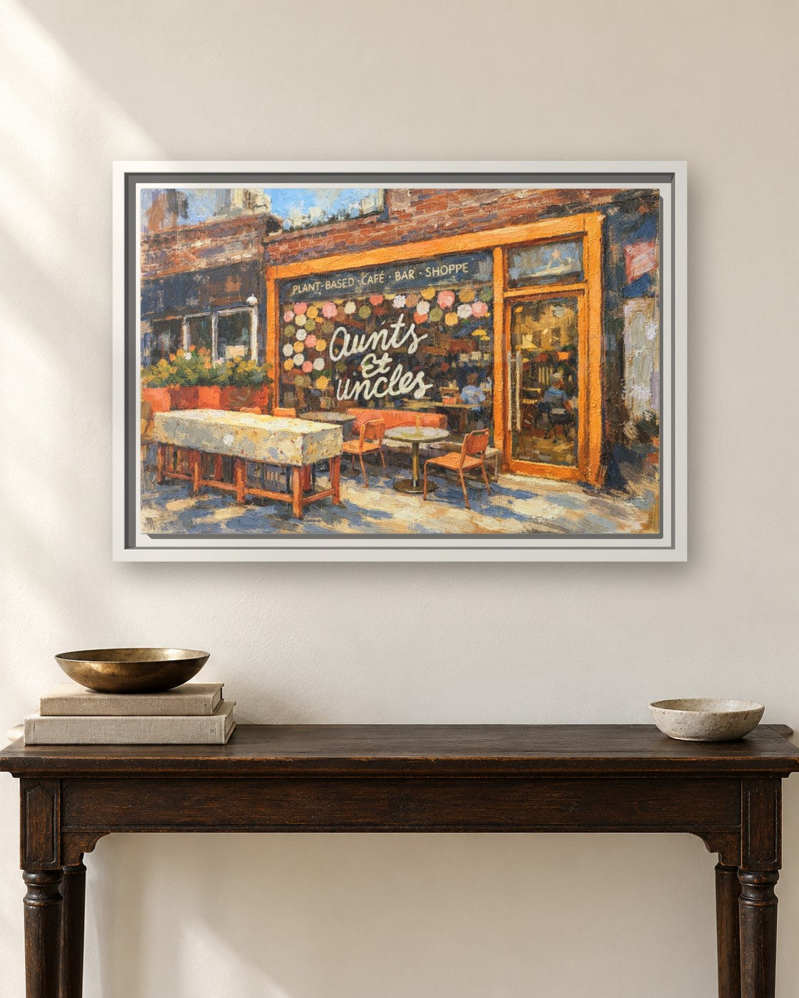 Aunts et Uncles framed canvas print hanging above a sideboard
