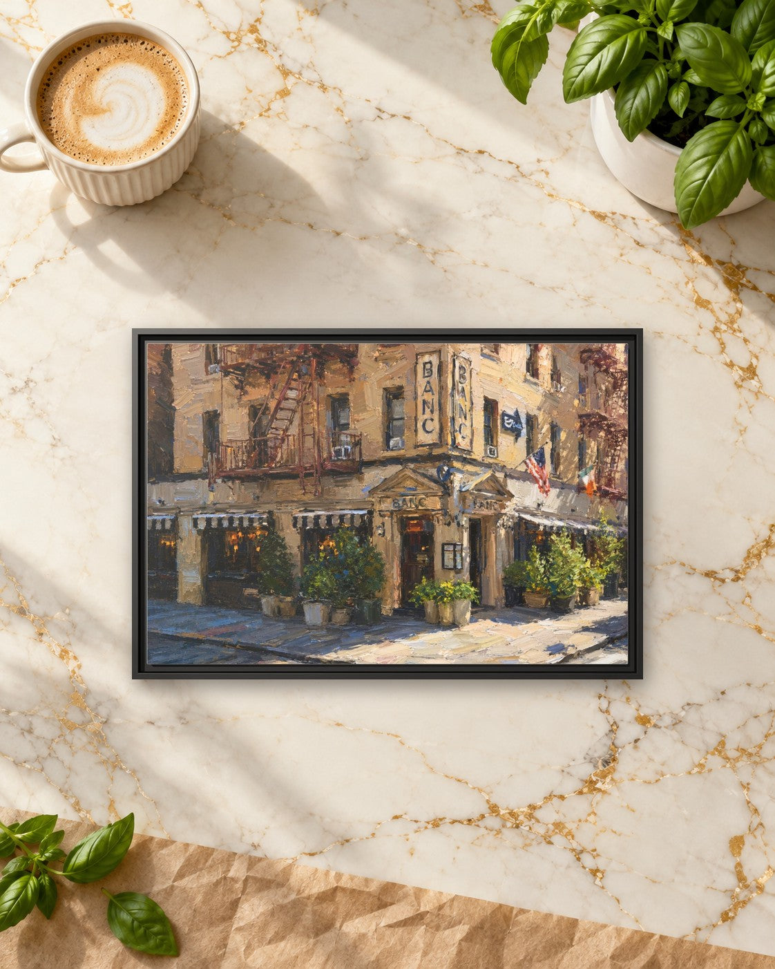 Banc Cafe framed canvas print lying on a table