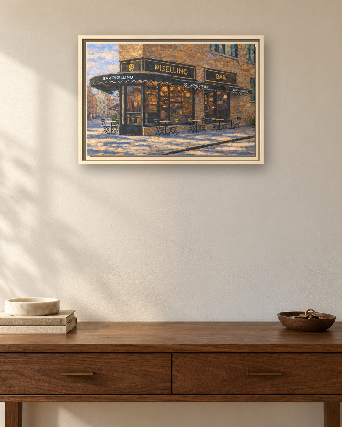 Bar Pisellino framed canvas print hanging above a sideboard