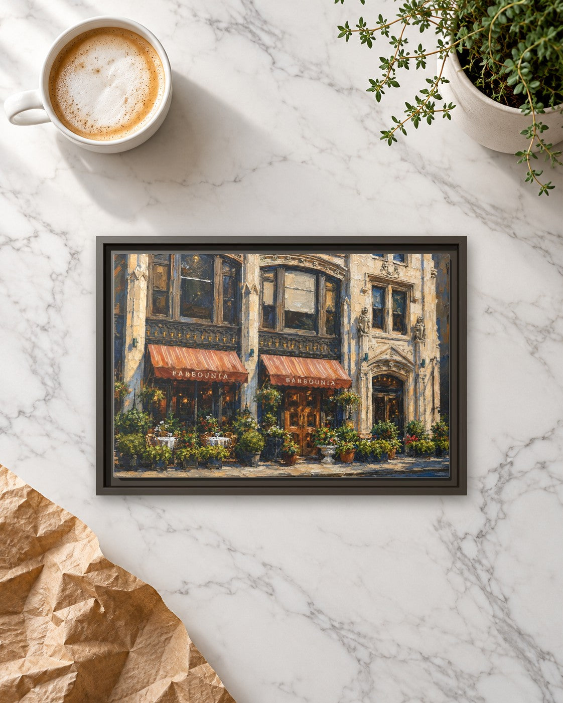 Barbounia framed canvas print lying on a table