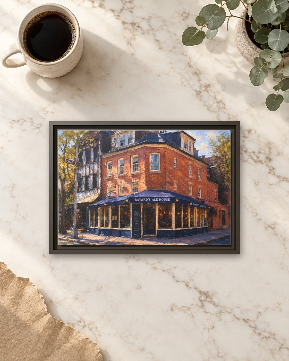 Bayard's Ale House framed canvas print lying on a table