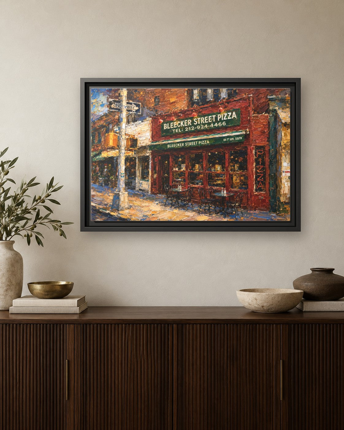 Bleecker Street Pizza framed canvas print hanging above a credenza