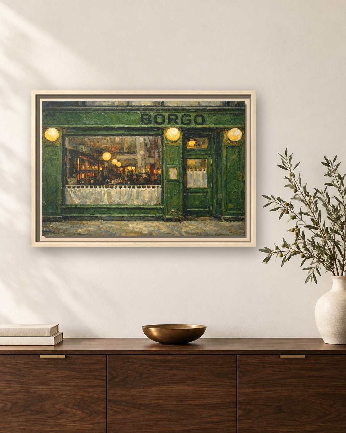 Borgo framed canvas print hanging above a sideboard