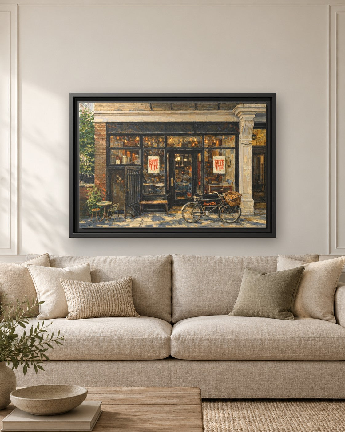 Buvette framed canvas print hanging above a sofa
