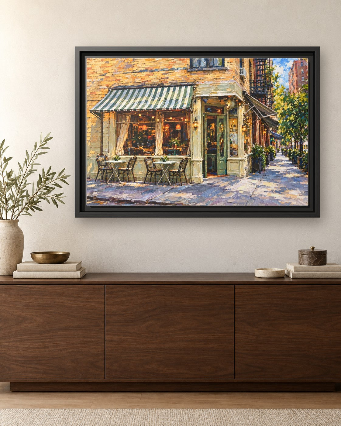 Cafe Cluny framed canvas print hanging above a credenza