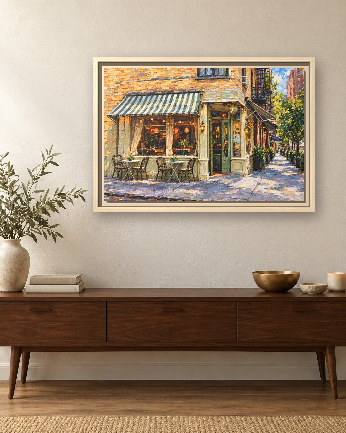 Cafe Cluny framed canvas print hanging above a sideboard