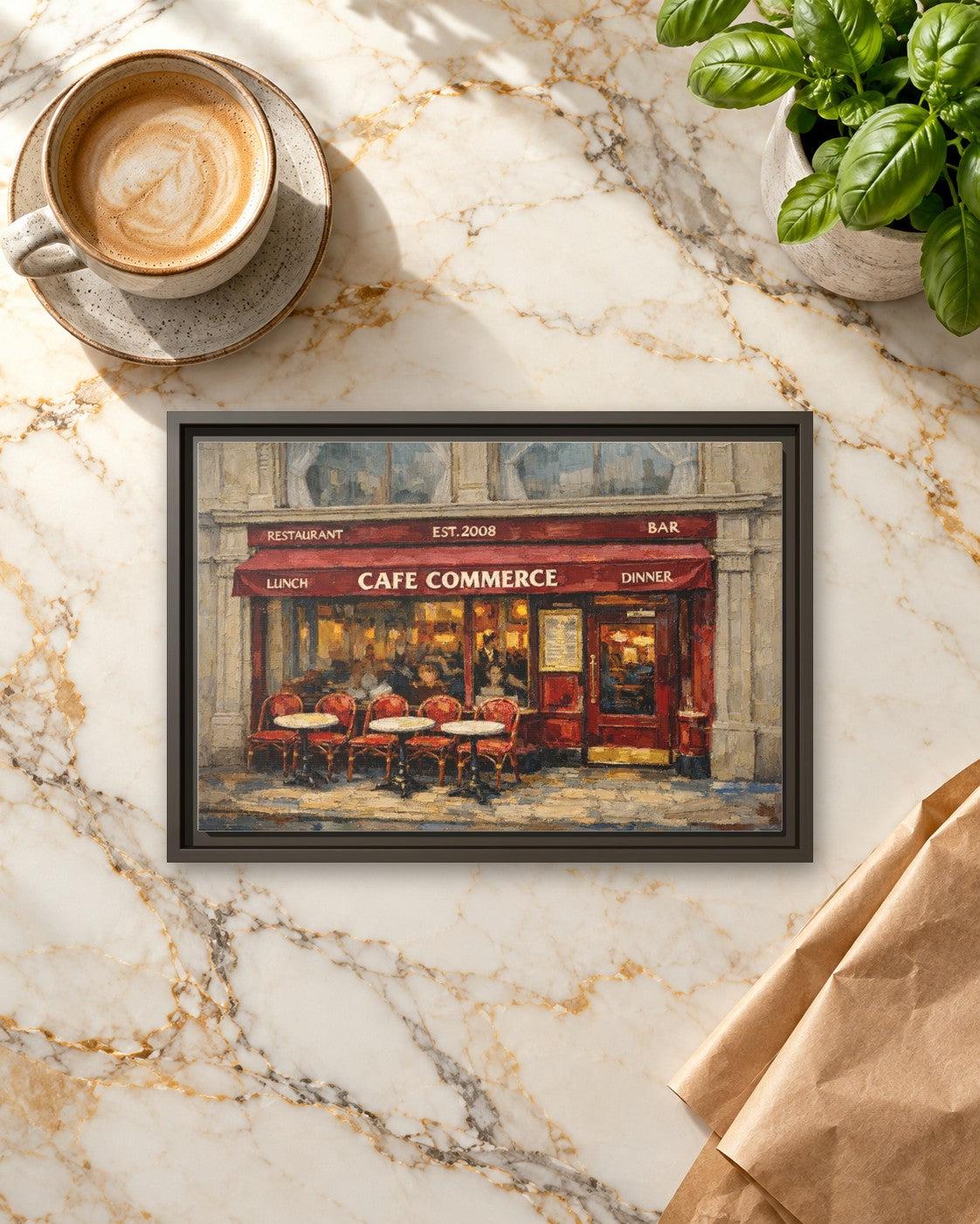 Cafe Commerce framed canvas print lying on a table