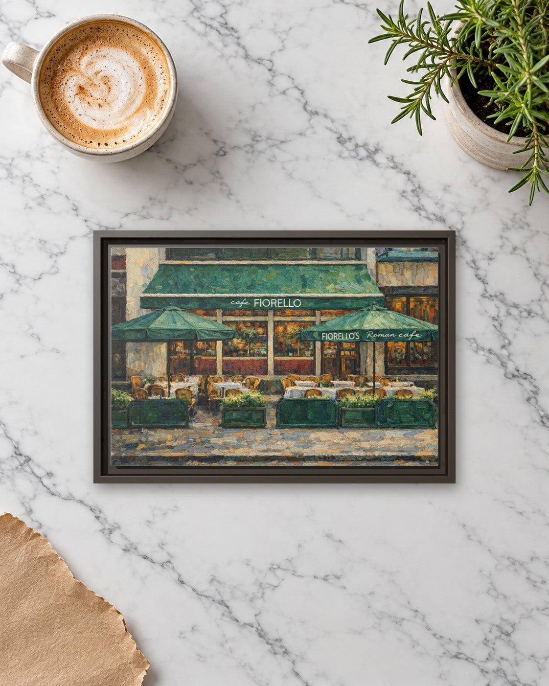 Cafe Fiorello framed canvas print lying on a table