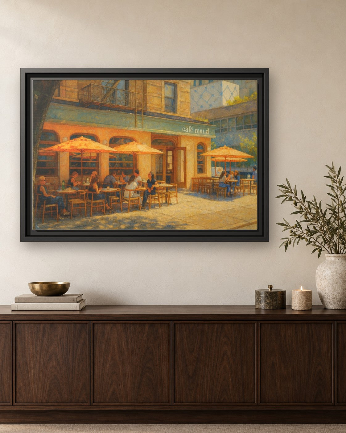 Café Maud framed canvas print hanging above a credenza