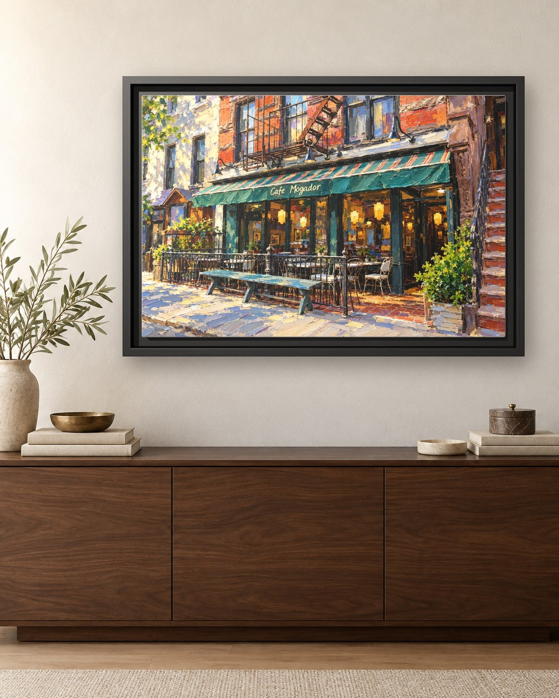 Cafe Mogador framed canvas print hanging above a credenza