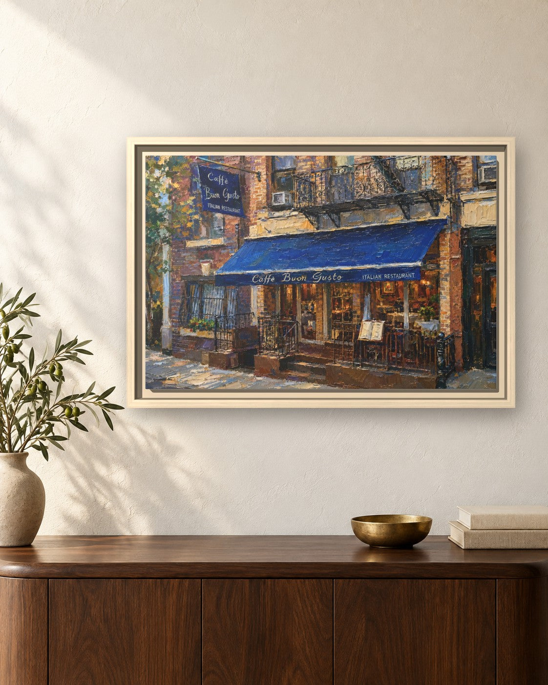 Caffe Buon Gusto framed canvas print hanging above a sideboard