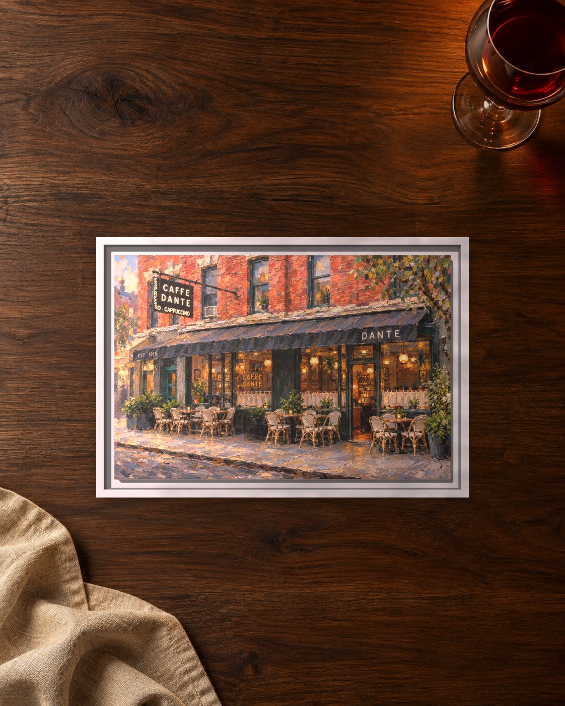 Caffe Dante framed canvas print lying on a table
