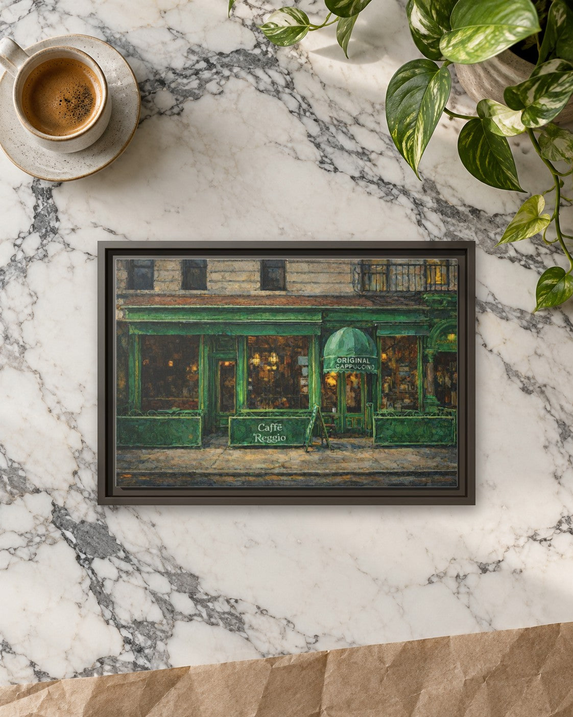 Caffe Reggio framed canvas print lying on a table