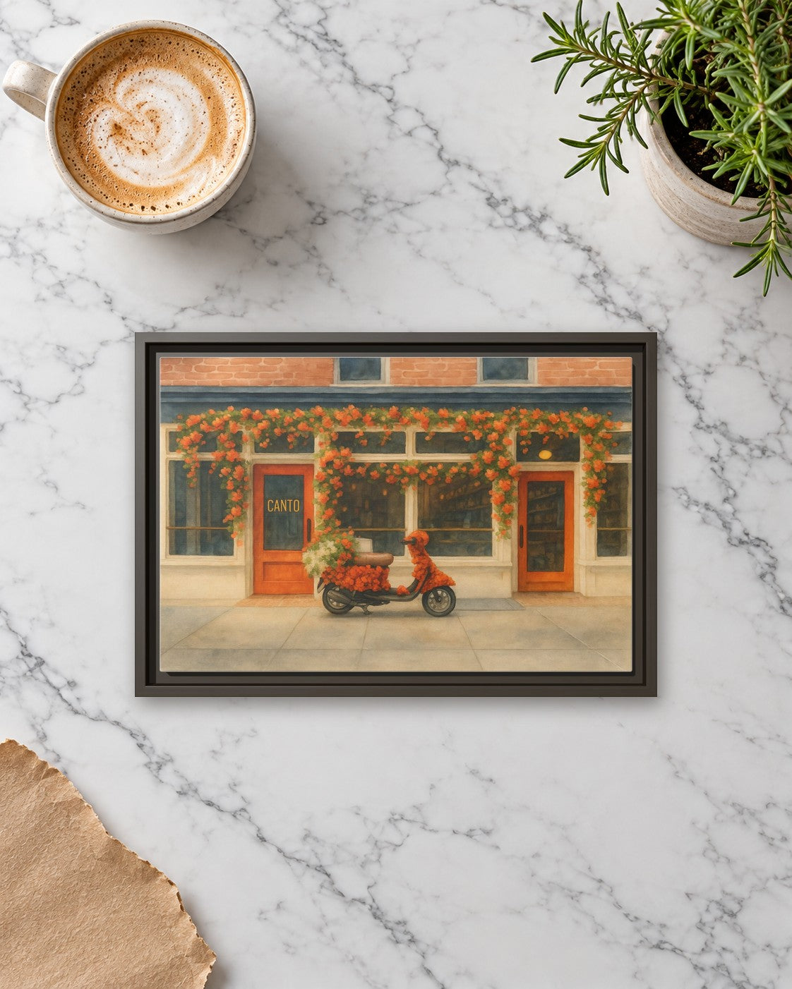 Canto West Village framed canvas print lying on a table