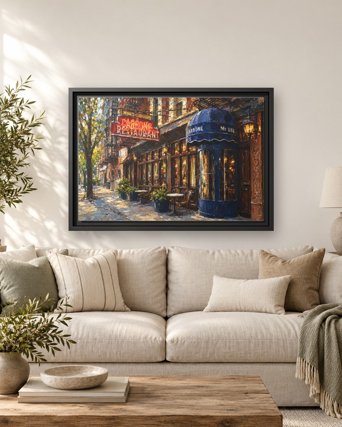 Carbone framed canvas print hanging above a sofa