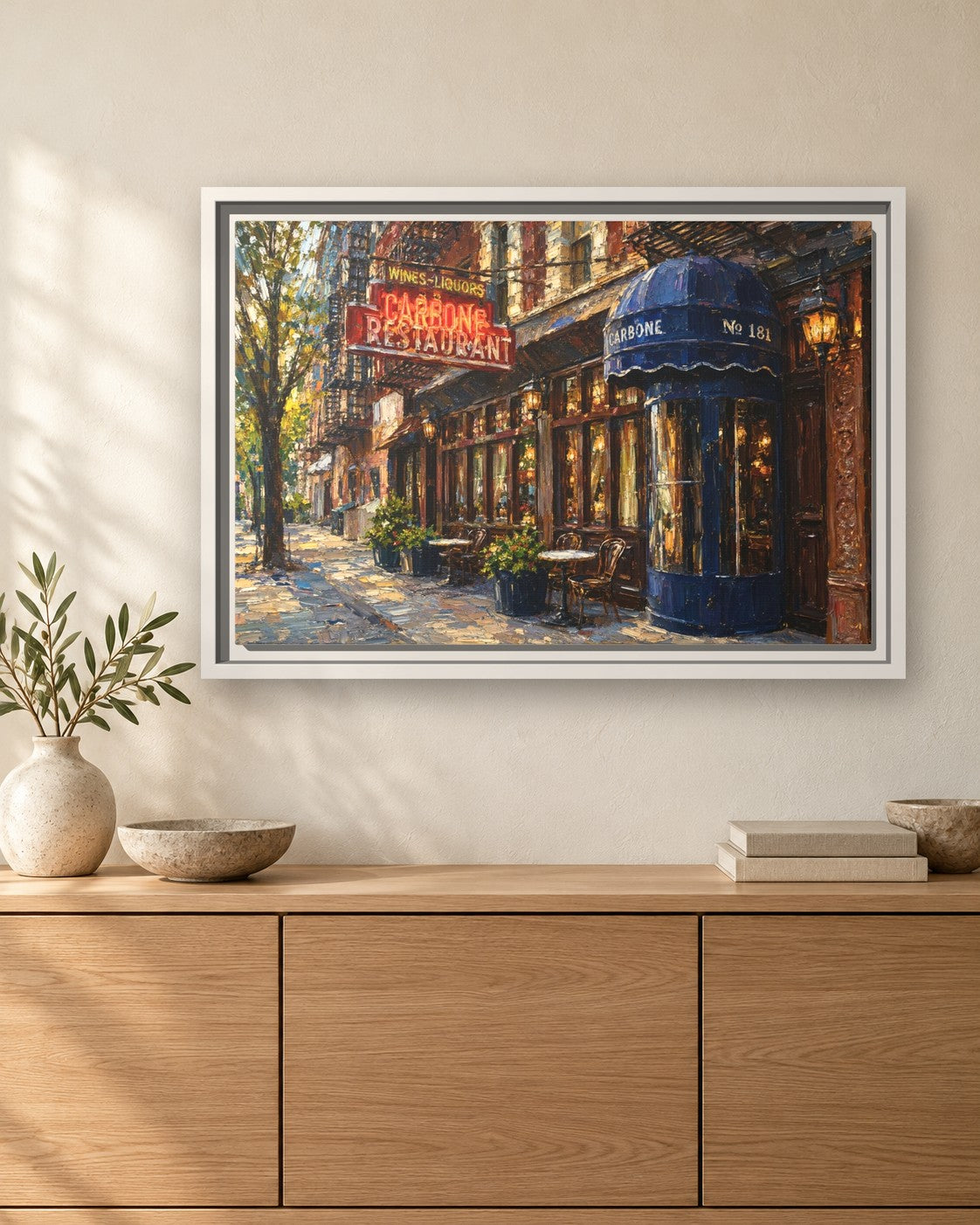 Carbone framed canvas print hanging above a sideboard