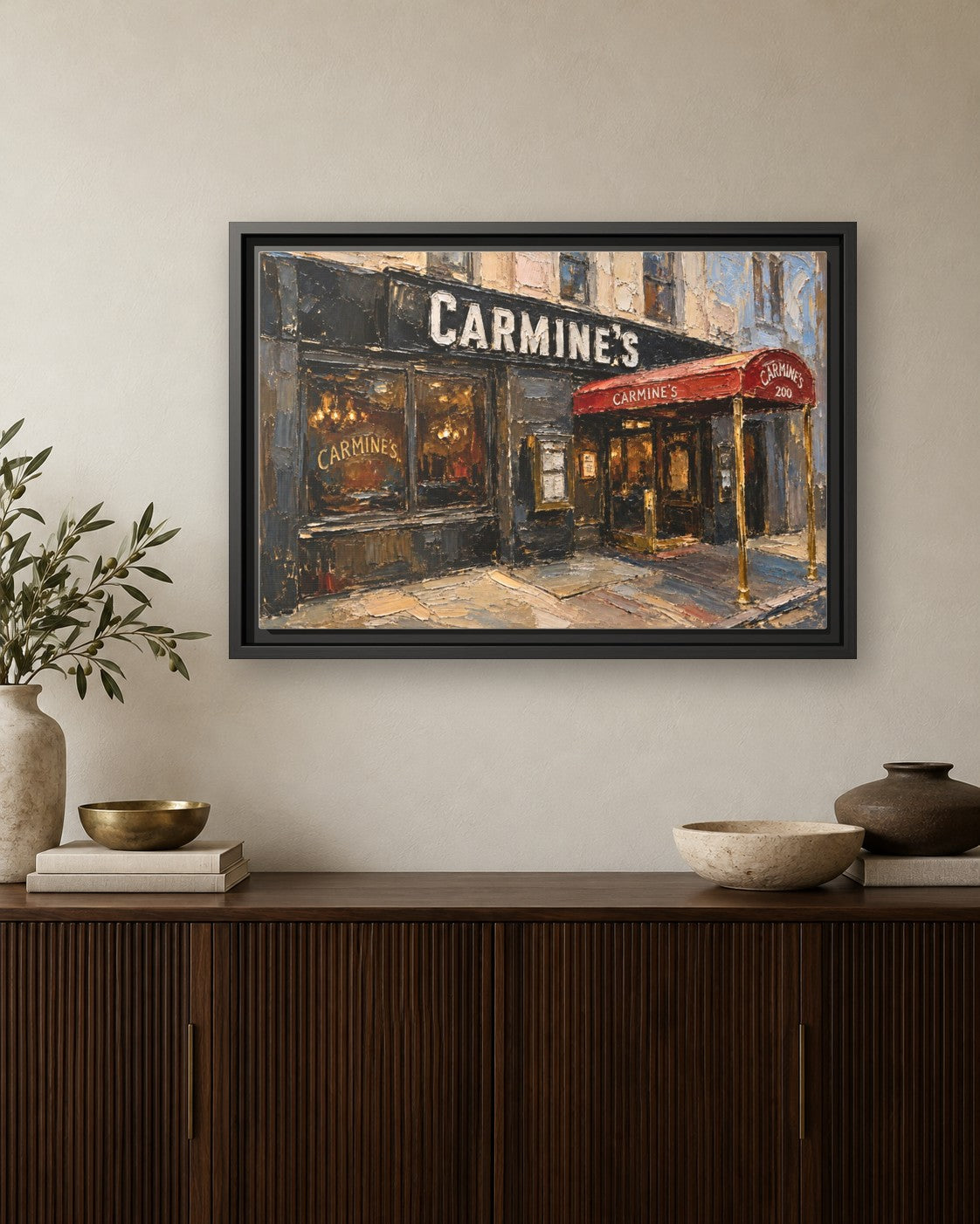 Carmine's framed canvas print hanging above a credenza