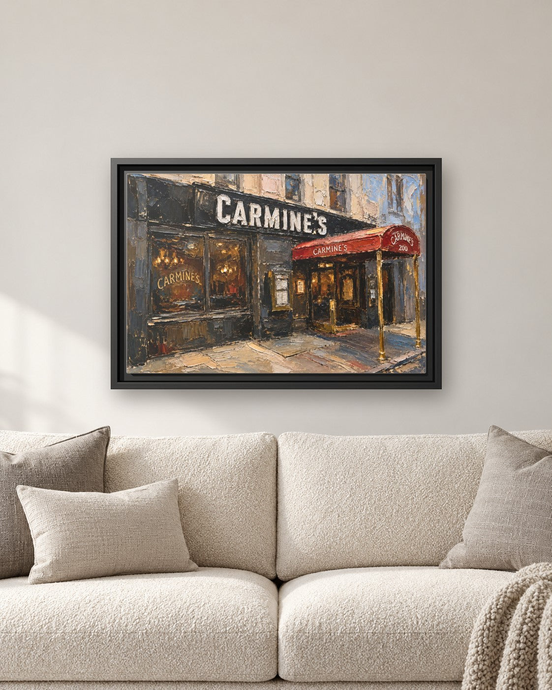 Carmine's framed canvas print hanging above a sofa