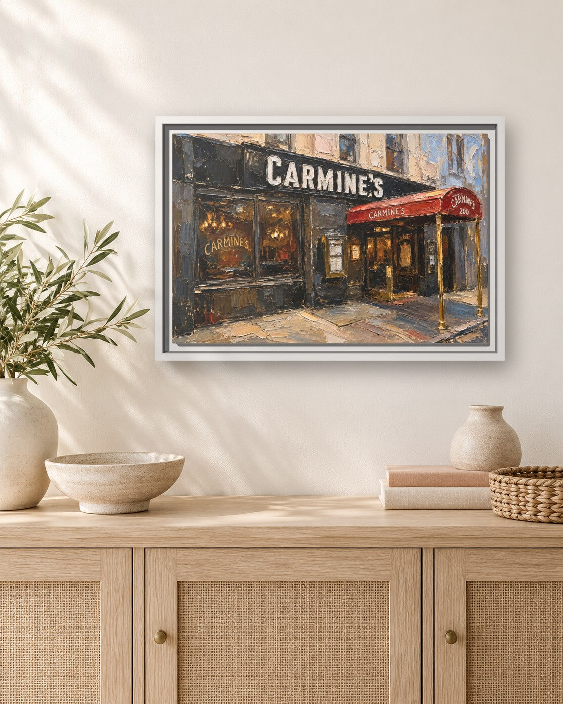 Carmine's framed canvas print hanging above a sideboard