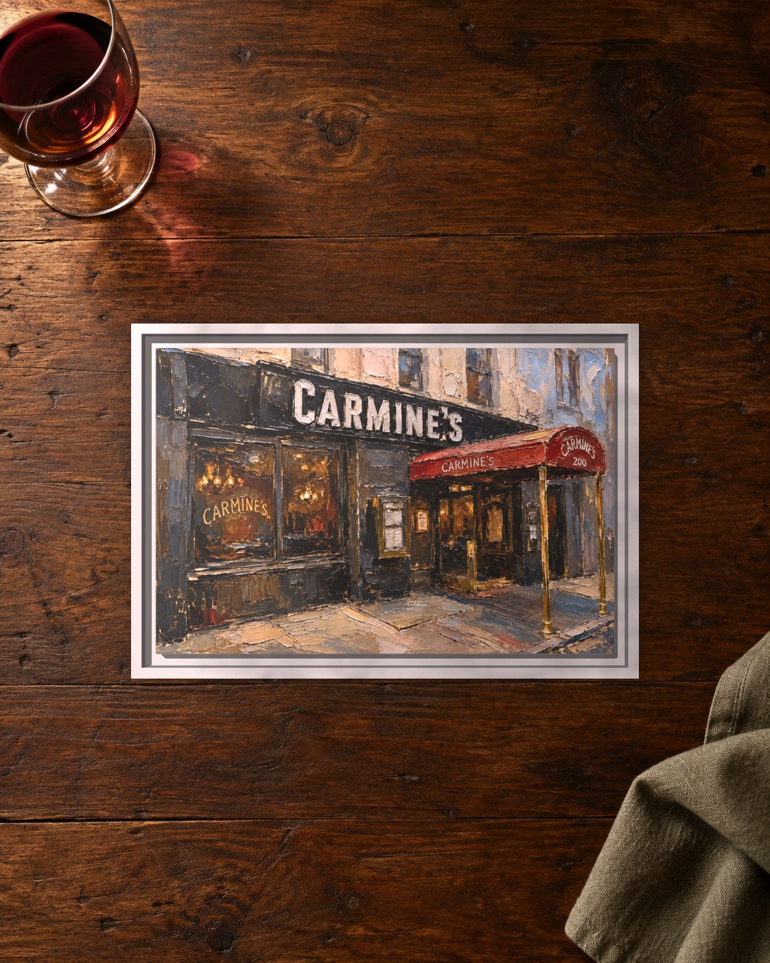 Carmine's framed canvas print lying on a table