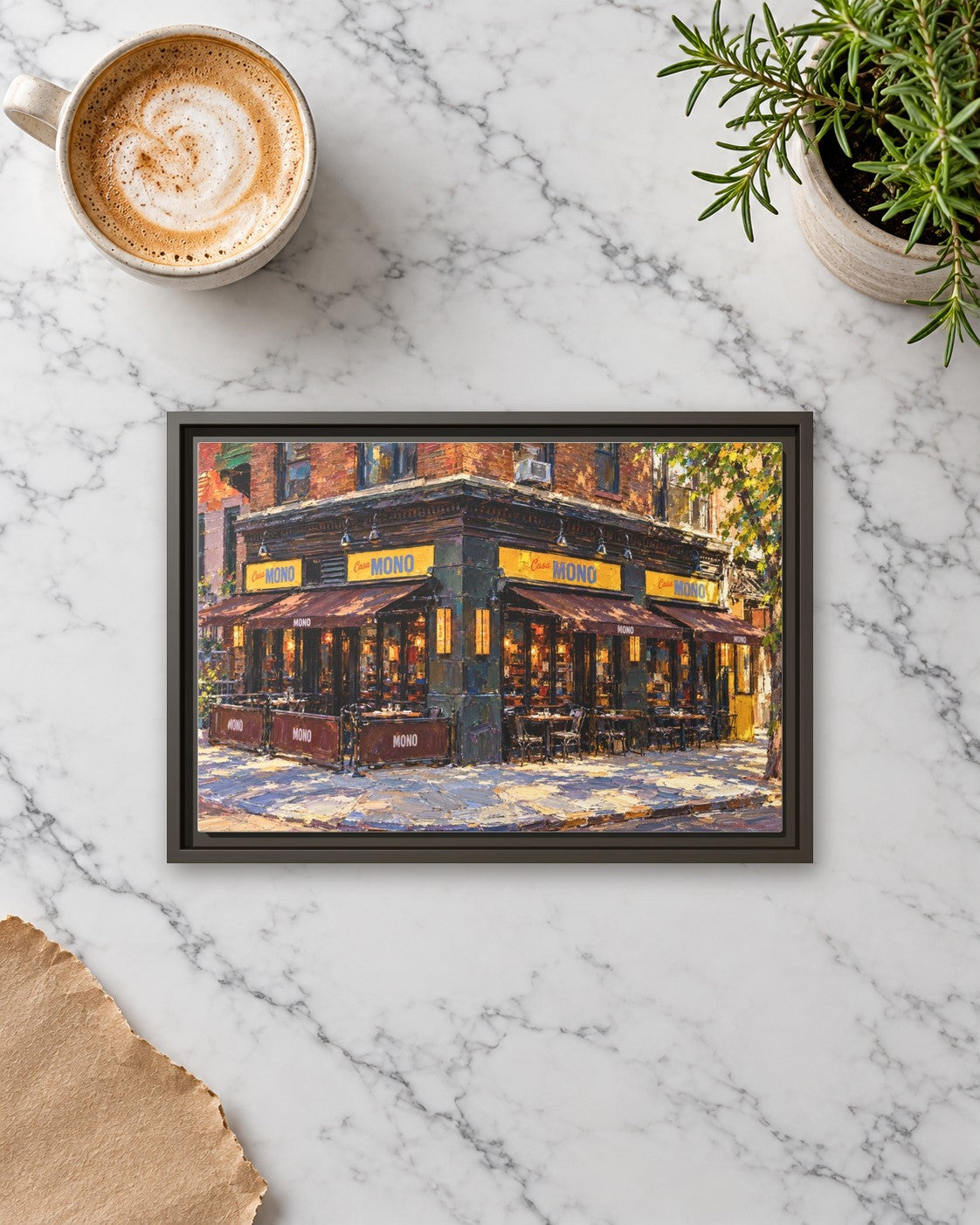 Casa Mono framed canvas print lying on a table