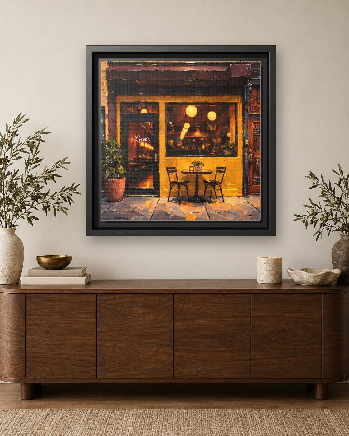 Cervo's framed canvas print hanging above a credenza