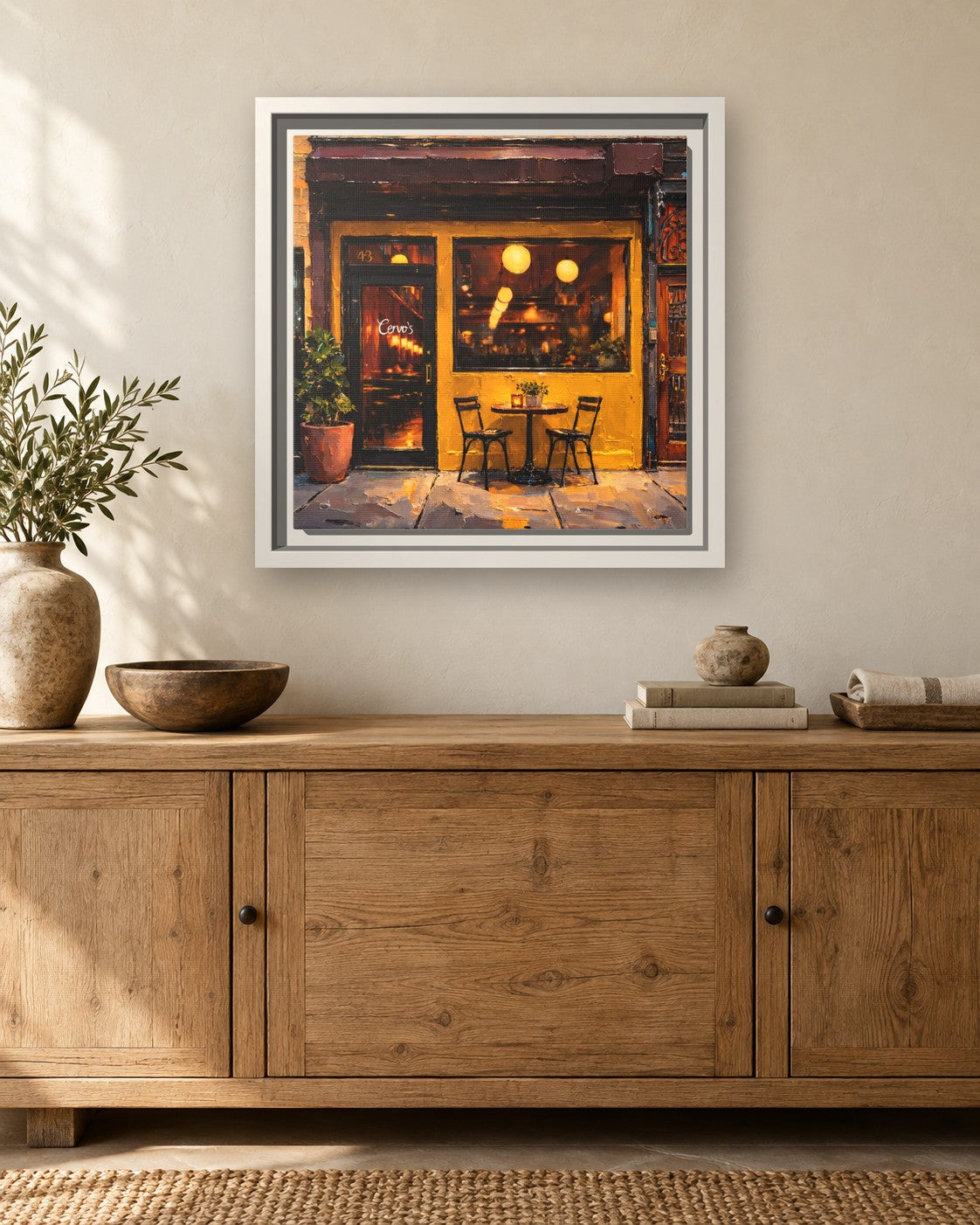 Cervo's framed canvas print hanging above a sideboard
