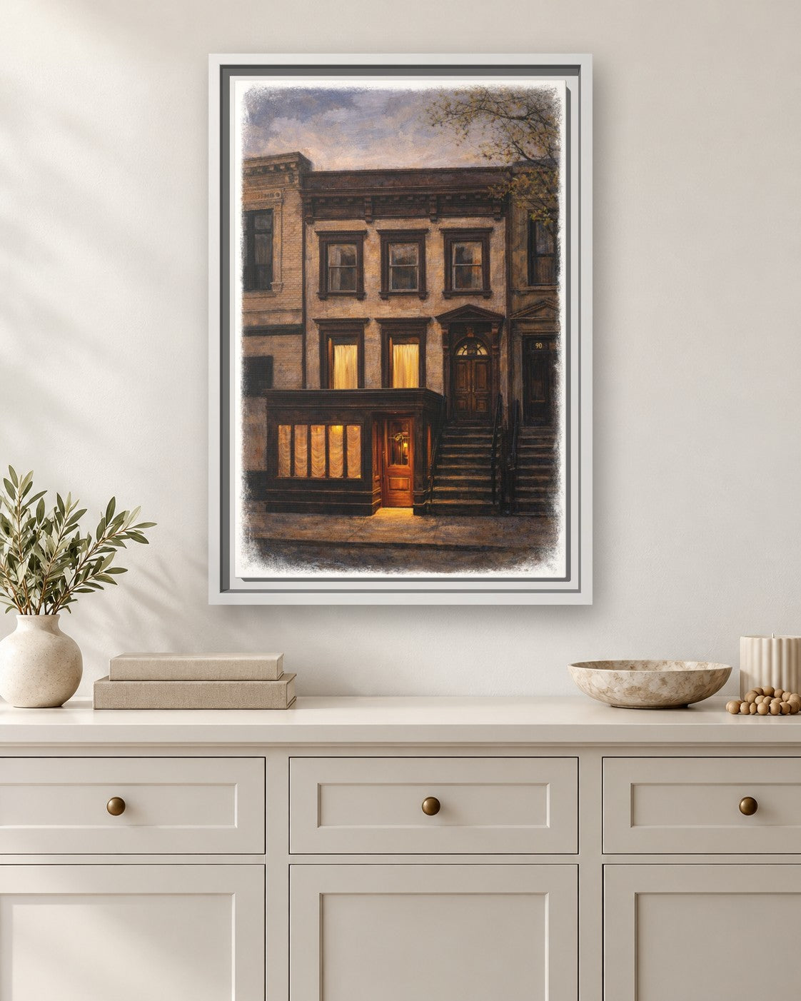 Chez Fifi framed canvas print hanging above a sideboard