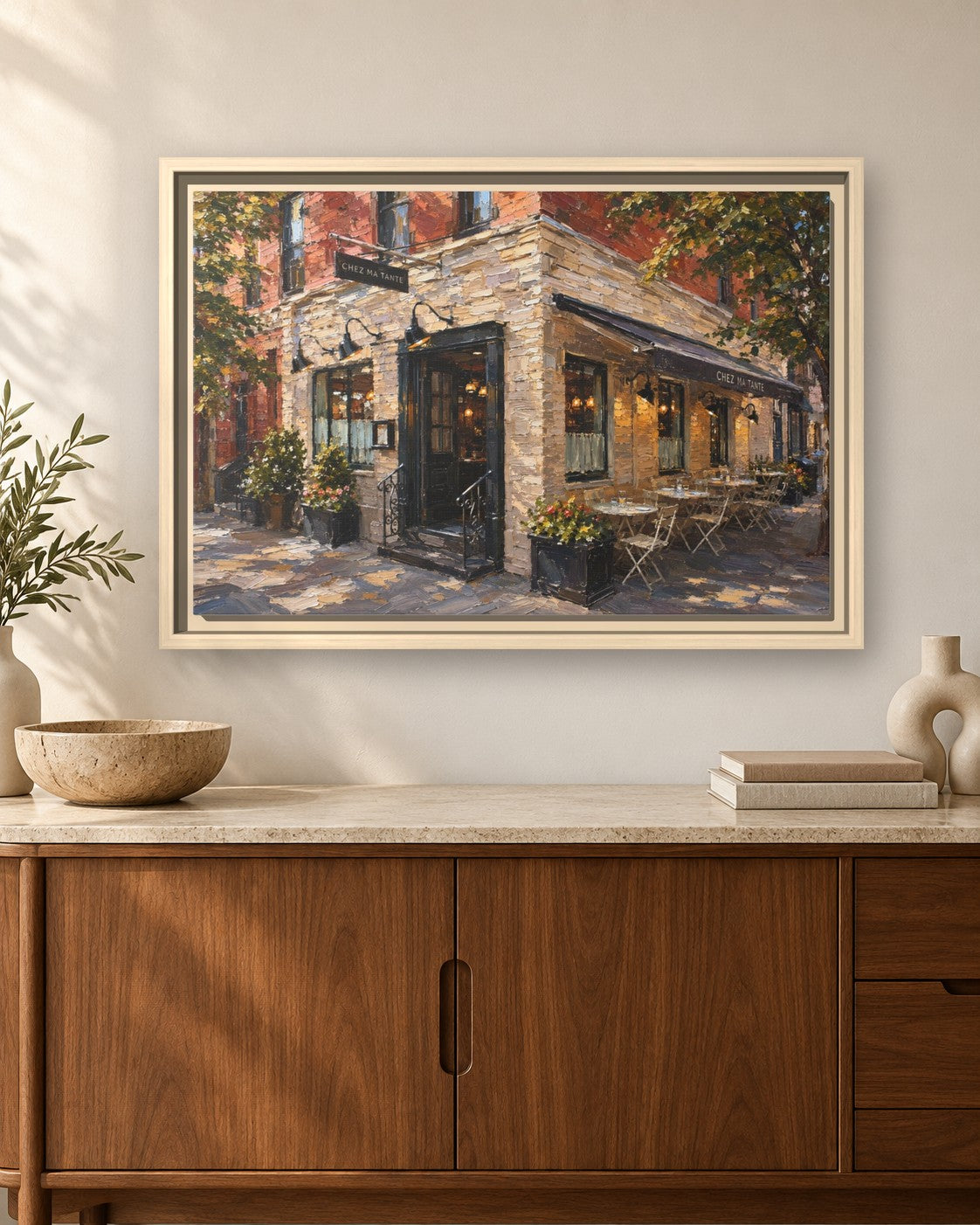 Chez Ma Tante framed canvas print hanging above a sideboard