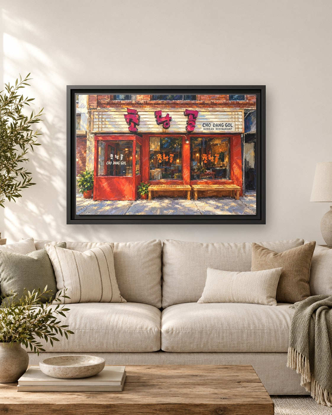 Cho Dang Gol framed canvas print hanging above a sofa