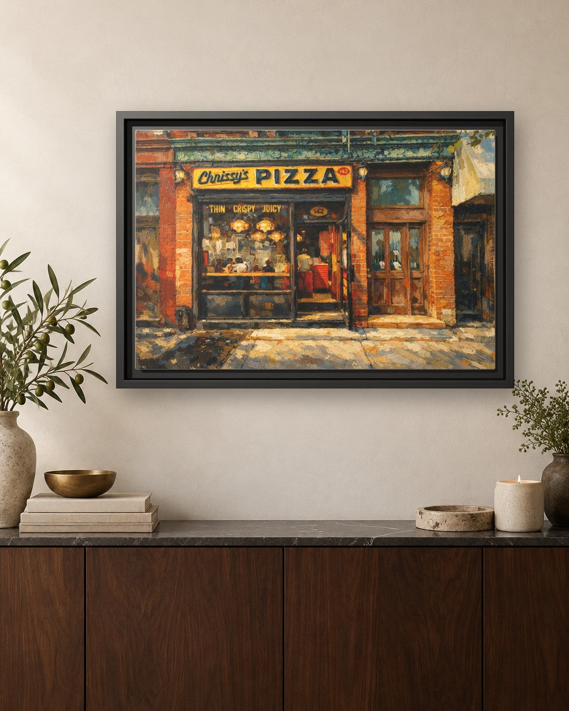 Chrissy's Pizza framed canvas print hanging above a credenza
