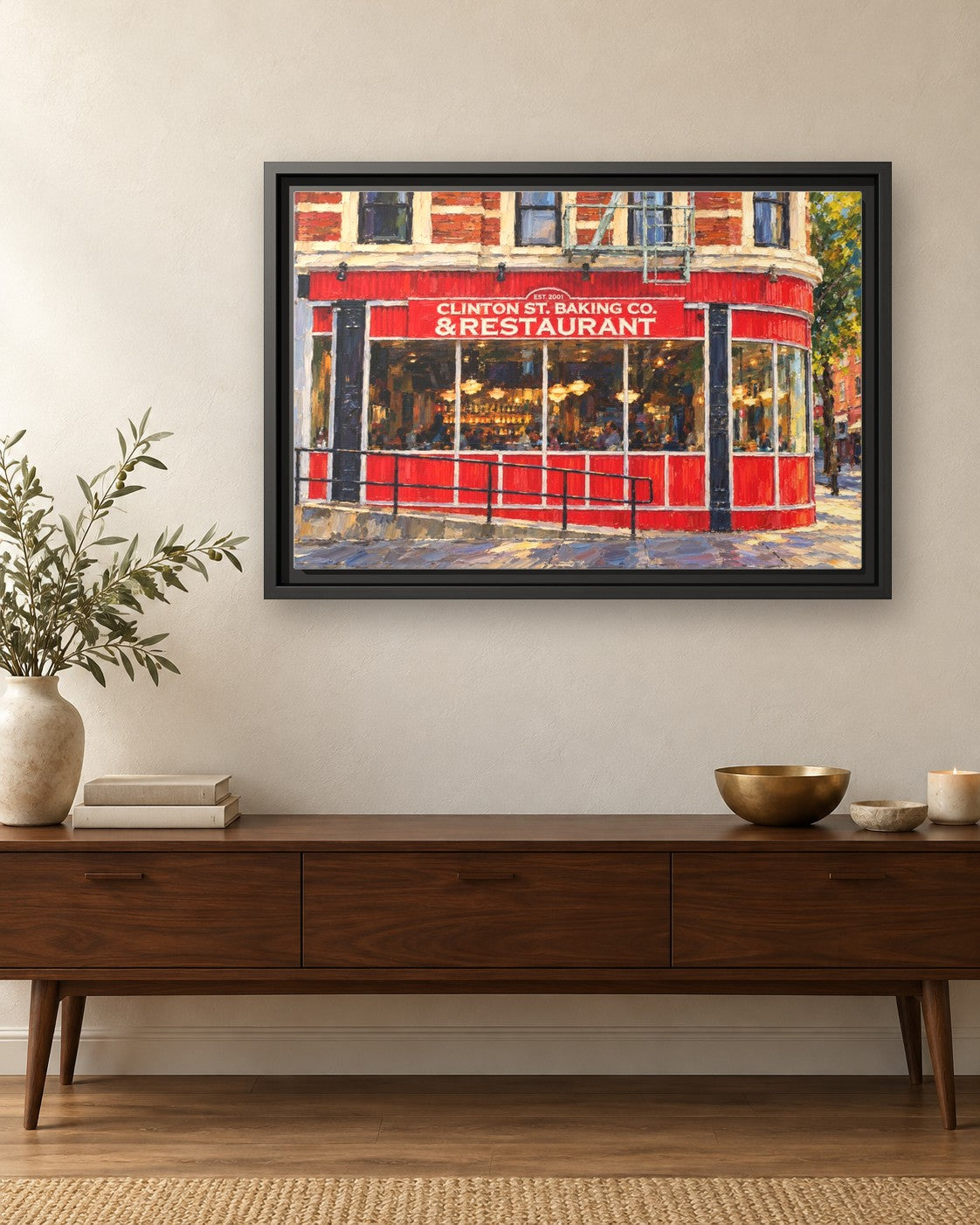 Clinton Street Baking Company framed canvas print hanging above a credenza