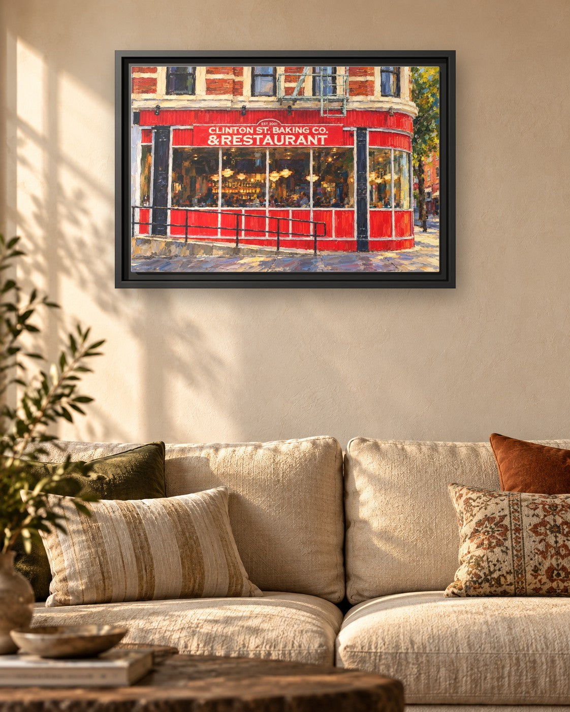 Clinton Street Baking Company framed canvas print hanging above a sofa