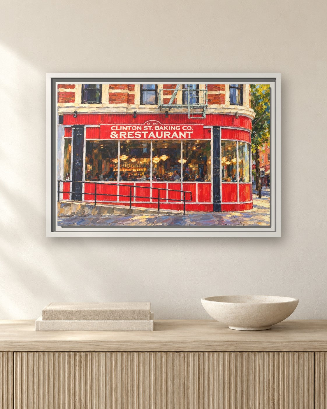 Clinton Street Baking Company framed canvas print hanging above a sideboard