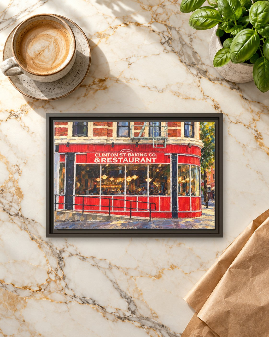 Clinton Street Baking Company framed canvas print lying on a table