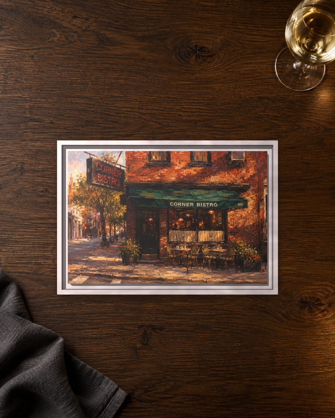 Corner Bistro framed canvas print lying on a table
