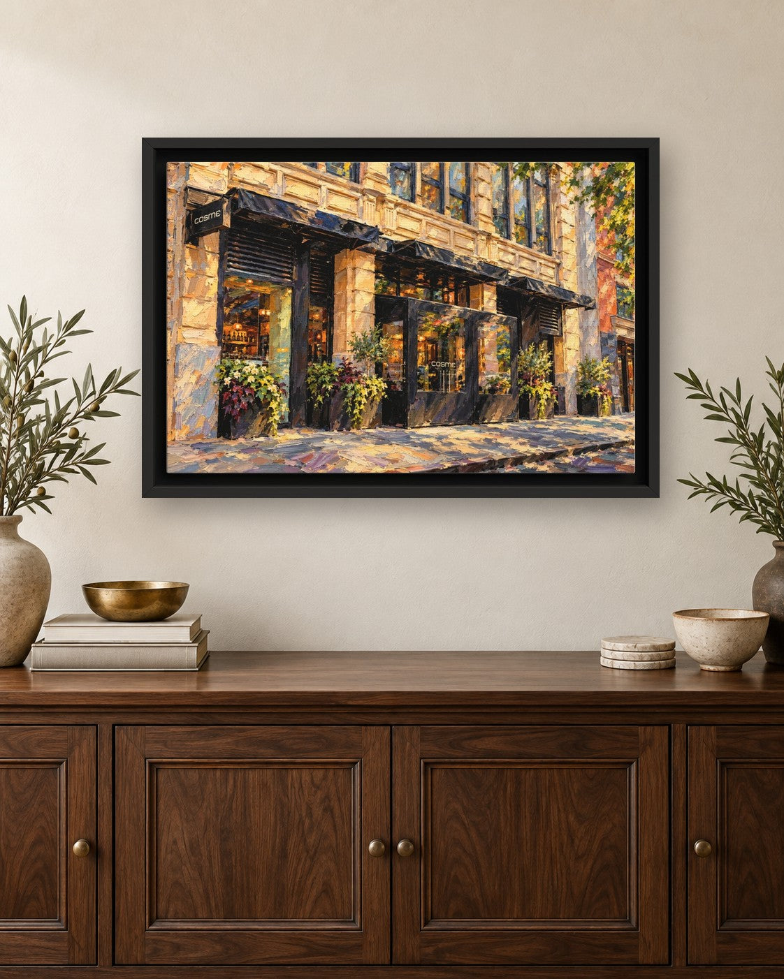 Cosme framed canvas print hanging above a credenza