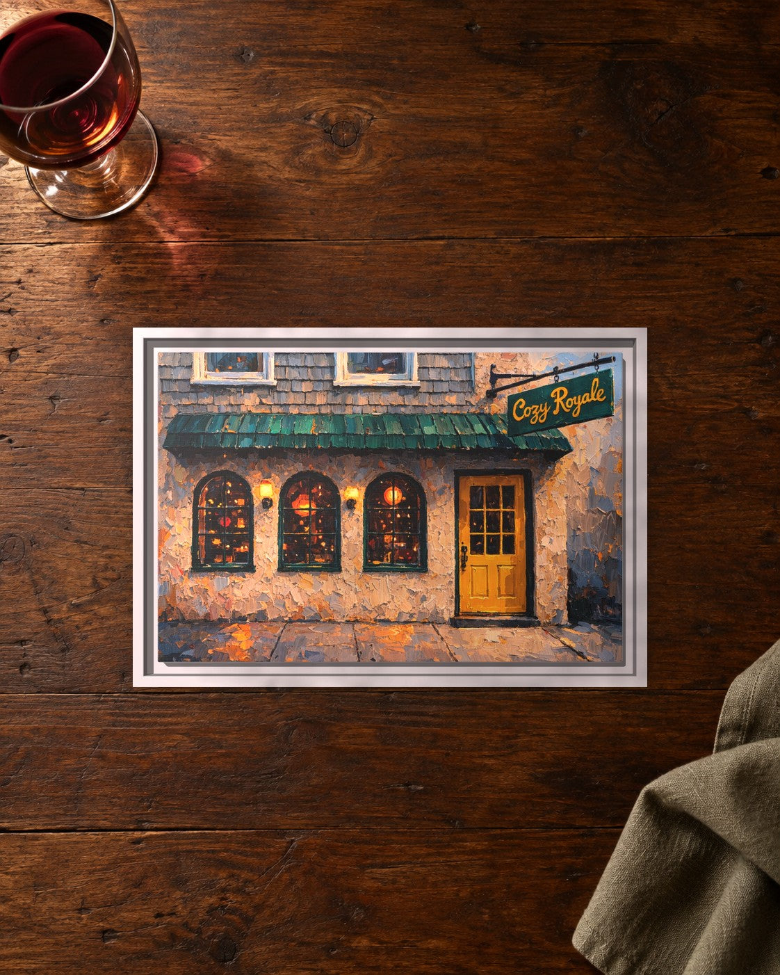 Cozy Royale framed canvas print lying on a table