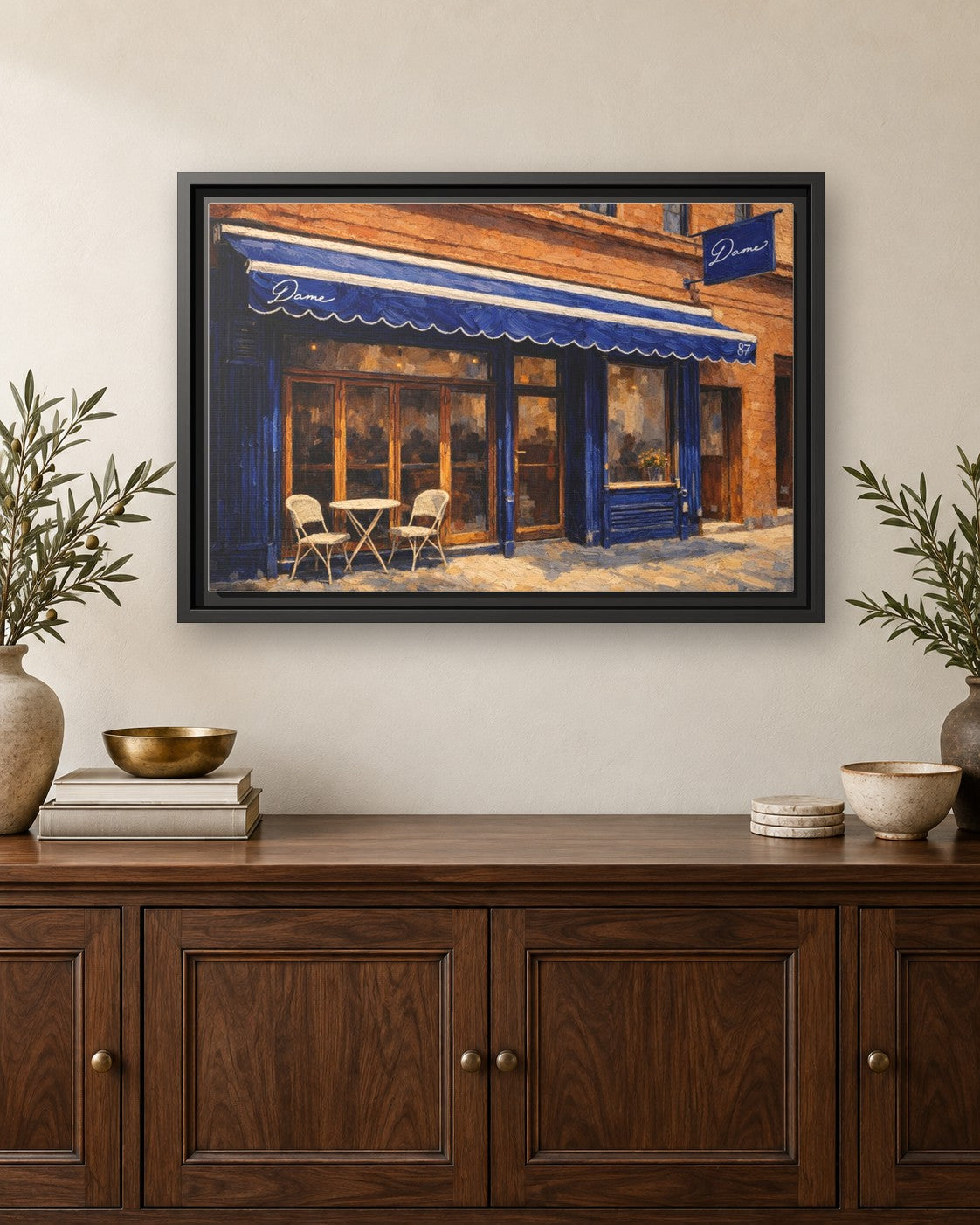 Dame framed canvas print hanging above a credenza