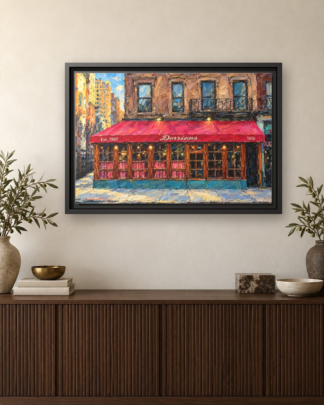 Dorrian's Red Hand framed canvas print hanging above a credenza