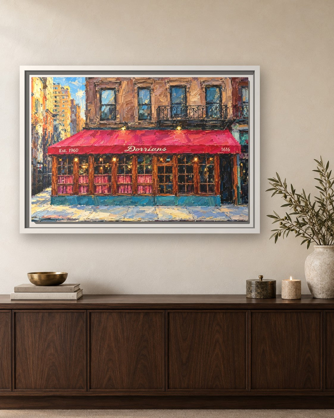Dorrian's Red Hand framed canvas print hanging above a sideboard