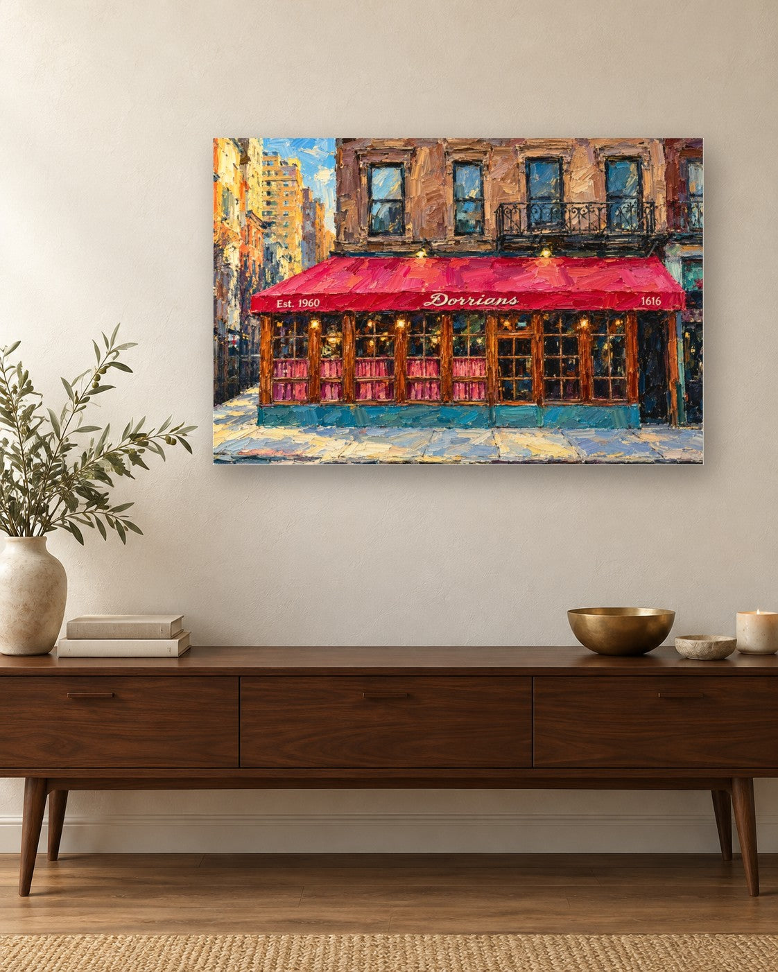 Dorrian's Red Hand framed canvas print hanging above a credenza